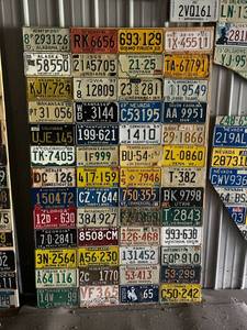 lot 454 image: 1969 License Plate From Every State Mounted on Plywood