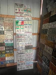 lot 458 image: Board Full of Mexican License Plates