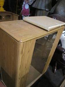 lot 35 image: Entertainment center with shelf. Ma...