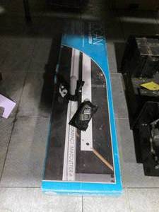 lot 68 image: Logan compact mat cutter in box wit...