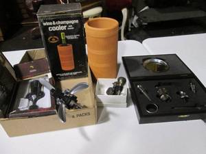 lot 178 image: Jewelry box style Wine accessory ki...