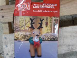 lot 23 image: Merry Moment 4 ft Inflatable LED Re...