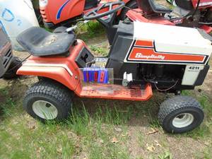 Simplicity riding mower. 4211 model. No deck. For parts or repair. As shown.