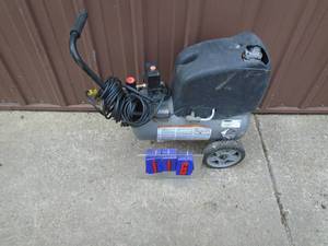 Small 6 - 8 gal air compressor. Used condition. Tested & works. As shown.