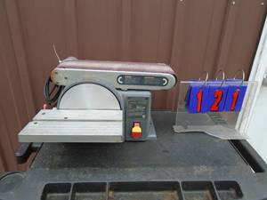 Performax 4 x 17 table top beltdisc sander. Used condition. Tested & works. As shown.