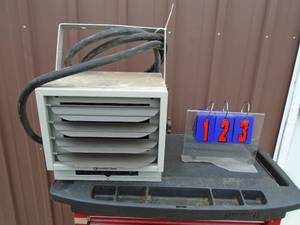 Comfort Zone hanging 220 v heater 7500 watt. Consignor states it does work. As shown.