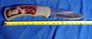 lot 54 image: Motorcycle Pocket Knife
