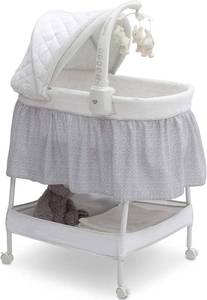 lot 154 image: Delta Children Smooth Glide Bassinet - Silver Linings