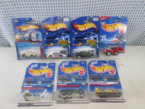 lot 320 image: (EC1) Assorted Hot Wheels in Packag...
