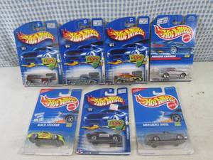 lot 321 image: (EC1) Assorted Hot Wheels in Packag...