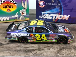 lot 264 image: 2001 Nascar Action Racing Collectibles RCCA Jeff Gordon Monte Carlo #24 DuPont  Looney Tunes 124 scale die cast stock car