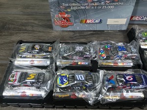 lot 293 image: 1999 Nascar Racing Champions Nascar Introduction Set - 12 silver chrome commemorative cars 164 scale die cast stock cars
