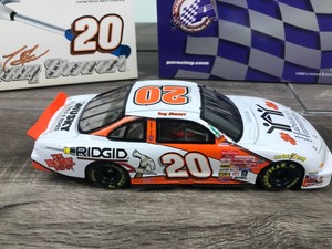 lot 296 image: 1999 Nascar Action Racing Collectibles Tony Stewart Pontiac #20  Habitat for Humanity 124 scale die cast stock car
