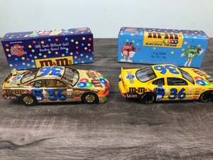 lot 302 image: 1999 Nascar Racing Champions 2 car set Ernie Irvan Pontiac #36  M&Ms 124 scale die cast stock car