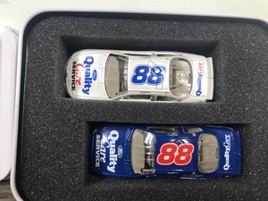 lot 342 image: 1999 Nascar Dale Jarrett Ford Taurus #88  Quality Care 2 car set 164 scale die cast