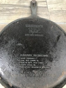lot 397 image: Wagners 1891 original 11.25 cast iron skillet griddle