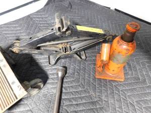 lot 171 image: 4way wrench, 2 jacks, jack stand and 2 sm dollies