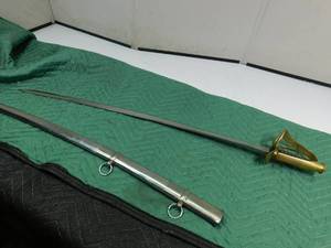 lot 12 image: metal sword with brass handle
