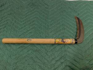 lot 18 image: small sickle with wooden handle