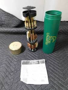lot 30 image: Ducks Unlimited gun Cleaning Kit shaped as a shotgun shell