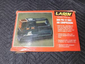 lot 38 image: Larin portable vehicle air compressor