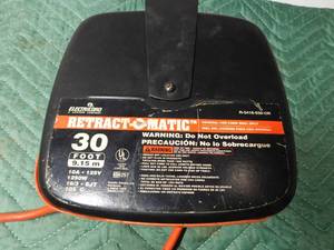 lot 63 image: Retract-o-Matic heavy duty extention cord