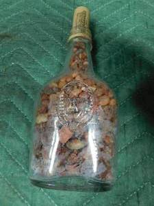 lot 99 image: Vintage bottle of agates