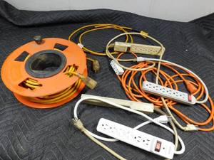 lot 129 image: 3 heavy duty extension cords and 4 surge cords and more