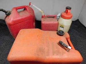 lot 140 image: 2 Gas cans, 1 boat tank, 1 oil safe can