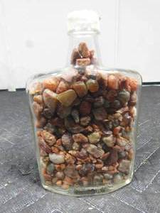 lot 203 image: Vintage bottle of agates