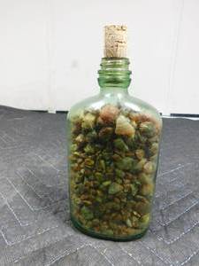 lot 204 image: Green vintage bottle of agates