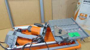 lot 6 image: RIDGID 9 Amp Corded 7 in. Wet Tile Saw with Stand Model # R4031S UPC Code # 648846070278