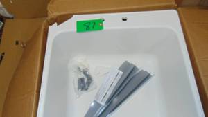 lot 87 image: LAUNDRY TUB, WHITE, 23 X 25-IN. Crack on top