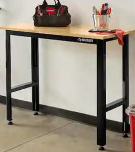 lot 73 image: Husky Ready-To-Assemble 4 ft. Solid Wood Top Workbench in Black Model # 20T002-1B UPC Code # 820909903437