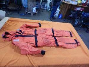 lot 56 image: Mustang Survival Anti Exposure Suit Size XL