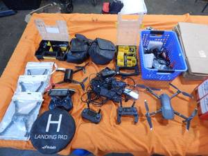 lot 76 image: JDI Mavic Pro Drone And Other Drone Parts
