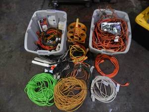 lot 10 image: 2- Totes Of Extension Cords, Multi Plugs, Timers (One Is For Scrap Or Repair)