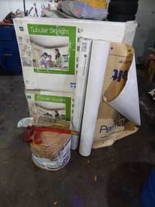 lot 13 image: Roofing Underlayment, 2-New Tubular Skylights(Damaged Packaging), Roll Of Insulation & Roofing Tools