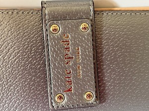 lot 136 image: Kate Spade Silver Metallic Colored Wallet