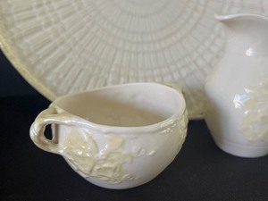 lot 67 image: Limpet Design Belleek Serving Pieces