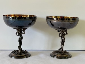 lot 91 image: Pair of Vintage Figural Silver Plate Champagne Stems