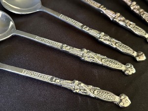 lot 86 image: (10) Decorative Serving Spoons