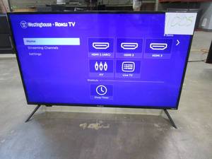 lot 1005 image: Westinghouse 43 4K Ultra HD Roku Smart TV with HDR WR43UT4009