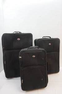 lot 215 image: American Tourister Luggage
