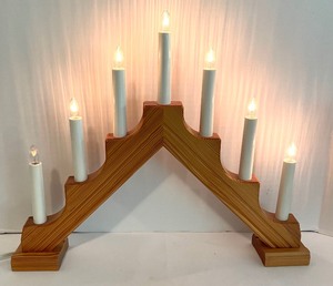 lot 254 image: Three Decorative Scandinvian Wooden Candle Holders