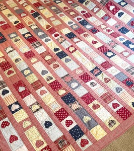 lot 260 image: Heart Themed Field Gear Quilt