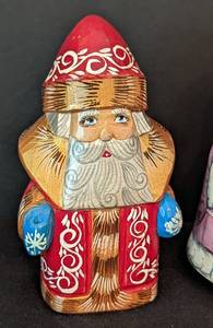 lot 342 image: Russian Painted Wood Santa Dolls and Ornament