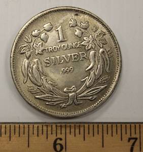 lot 19 image: Silver Round Coin Vintage 1 Troy Oz Sitting Seated Lady Liberty Flag