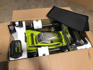 lot 10 image: Ryobi 20 in. 40-Volt 6.0 Ah Lithium-Ion Battery Brushless Cordless Walk Behind Self-Propelled Lawn Mower with Charger Included customer return see pictures