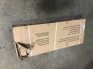 lot 38 image: Husky 48 in. Stainless Steel Work Surface for Regular Duty Welded Steel Garage Storage System Customer Returns See Pictures
